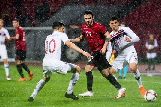 Tarik Elyounoussi of Norway, Kamer Qaka of Albania and