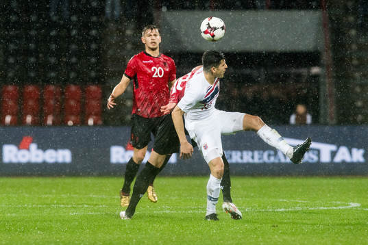 Enis Gavazaj of Albania and Tarik Elyounoussi of Norway