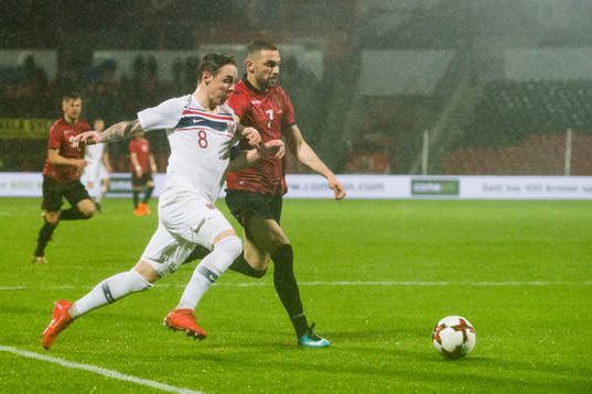 Stefan Johansen of Norway and Eros Grezda of Albania