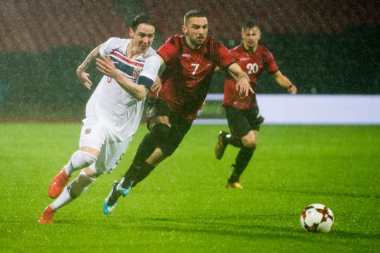Stefan Johansen of Norway and Eros Grezda of Albania