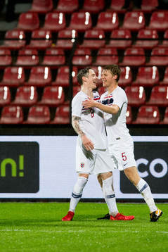 Stefan Johansen and Sigurd Rosted of Norway celebrate 1-0