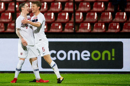Stefan Johansen and Sigurd Rosted of Norway celebrate 1-0