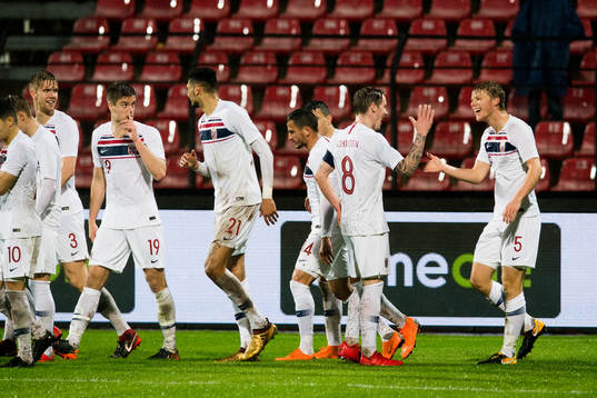 Sigurd Rosted of Norway celebrates 1-0 with his teammates