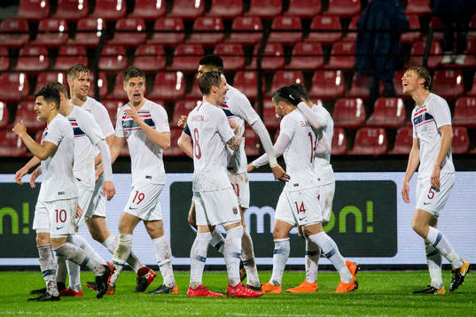 Sigurd Rosted of Norway celebrates 1-0 with his teammates