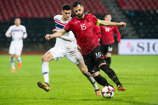 Bjørn Maars Johnsen of Norway and Mërgim Mavraj of Albania
