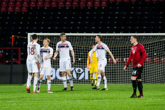 Sigurd Rosted of Norway celebrates with his teammates
