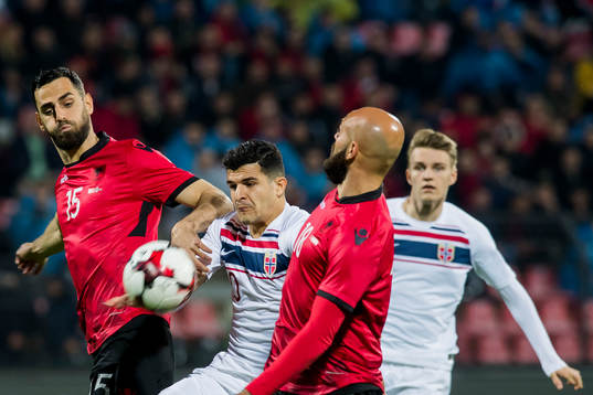Mërgim Mavraj of Albania, Tarik Elyounoussi of Norway,