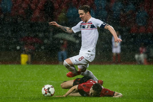 Stefan Johansen of Norway and Kamer Qaka of Albania