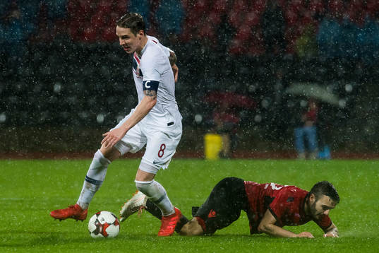 Stefan Johansen of Norway and Kamer Qaka of Albania