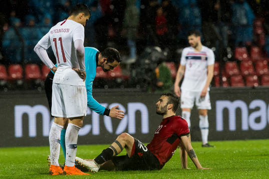 Kamer Qaka of Albania with an injury