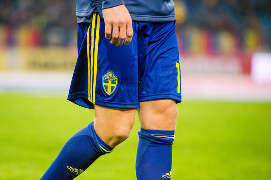 Spelare lämnar planen före en träningslandskamp i