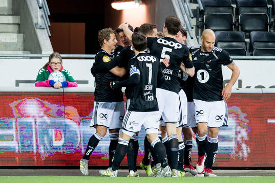 Pål André Helland of Rosenborg celebrates with teammates