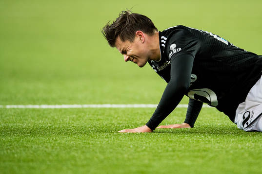 Pål André Helland of Rosenborg with an injury