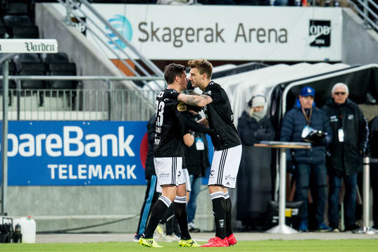 Pål André Helland of Rosenborg celebrates with teammate