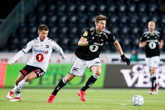 Vebjørn Alvestad Hoff of Odd and Nicklas Bendtner of