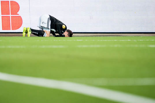 Pål André Helland of Rosenborg with an injury