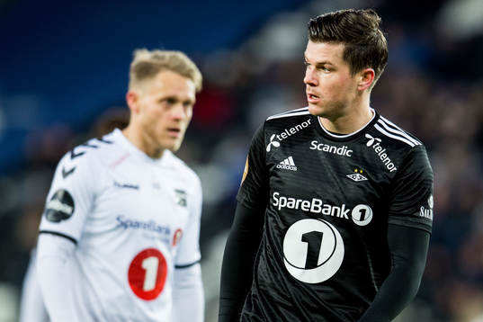Pål André Helland of Rosenborg and Fredrik Nordkvelle of