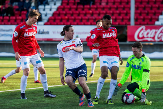 Tommy Høiland of Viking and Goalkeeper Tobias Trautner of
