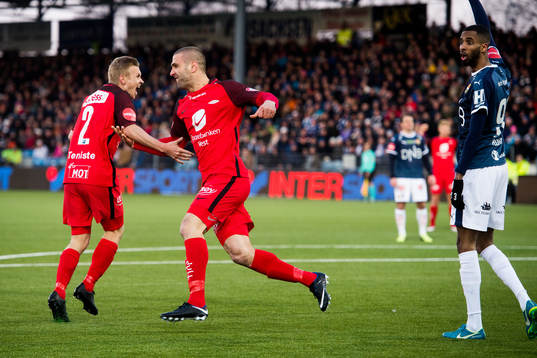 Azar Karadas of Brann celebrates 1-1 while Amahl William