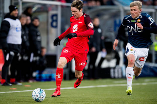 Kasper Skaanes of Brann and Jonathan Parr of Strømsgodset