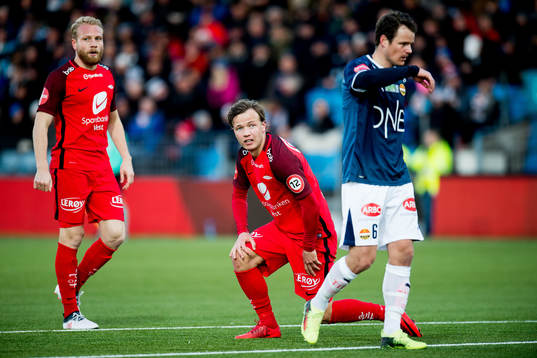Fredrik Haugen of Brann and Henning Hauger of Strømsgodset