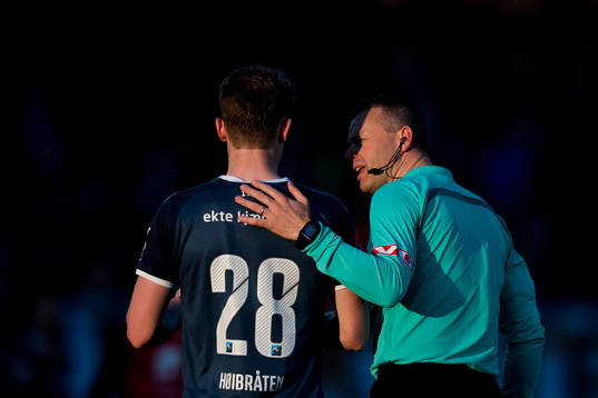 Marius Høibråten of Strømsgodset and Svein Oddvar Moen,