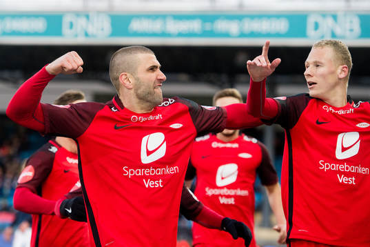 Azar Karadas and Kristoffer Barmen of Brann celebrate 1-1
