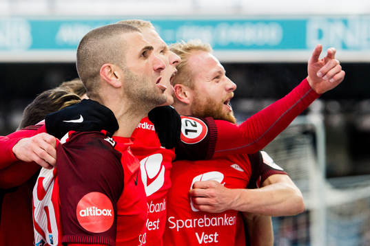 Azar Karadas and Kristoffer Barmen of Brann celebrate 1-1