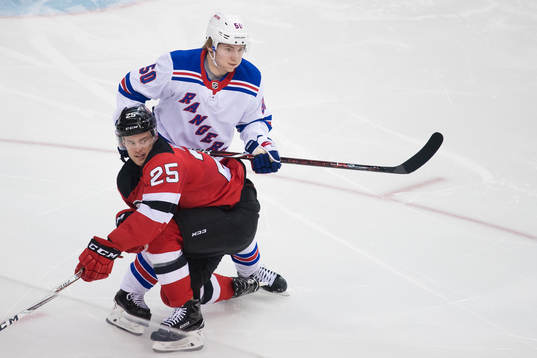 Devils Mirco Mueller och Rangers Lias Andersson