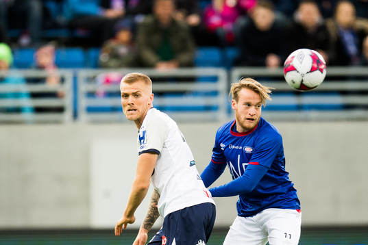 Eirik Ulland Andersen of Strømsgodset and Bård Finne of