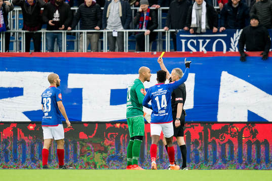 Goalkeeper Adam Larsen Kwarasey of Vålerenga gets a yellow