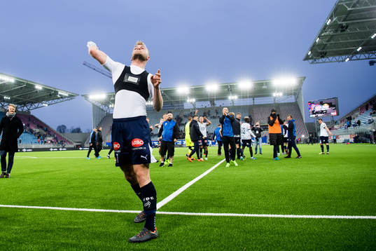 Herman Sørby Stengel of Strømsgodset throws his shirt to