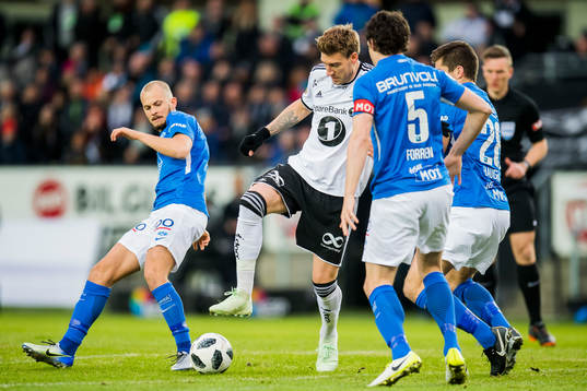 Eirik Hestad of Molde and Nicklas Bendtner of Rosenborg
