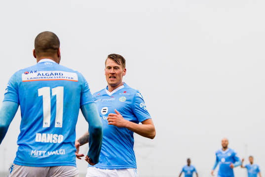Erixon Danso of Sandnes Ulf celebrates with teammate Kent