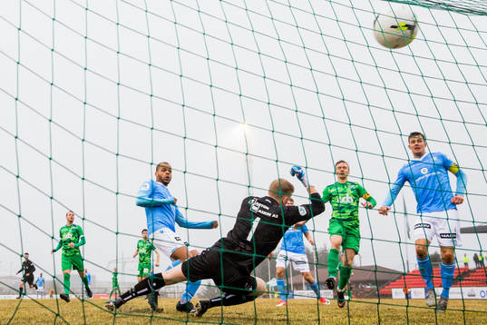 Erixon Danso of Sandnes Ulf scores 1-2 behind goalkeeper