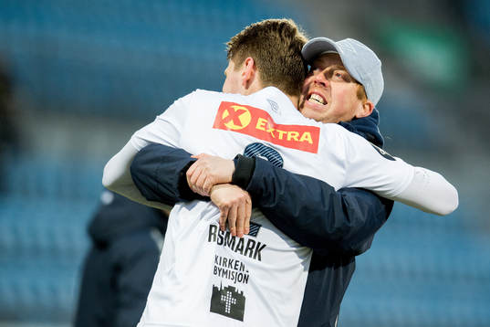 Svein Maalen, head coach of Ranheim, hugs match winner