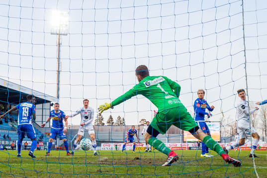 Christian Rismark of Ranheim scores 1-1 behind goalkeeper