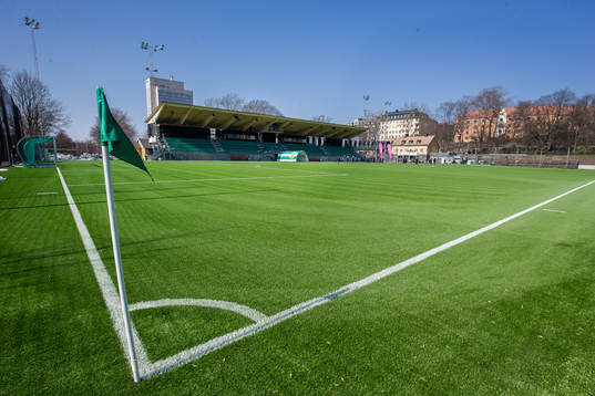 Vy över Hammarby IP med nya huvudläktaren i bakgrunden