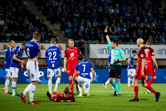 Ole Jørgen Halvorsen of Sarpsborg 08 is shown a yellow