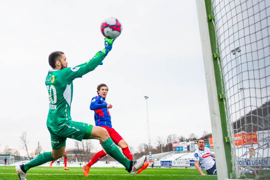 Tommy Høiland of Viking scores 2-0 behind goalkeeper