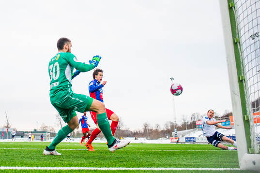 Tommy Høiland of Viking scores 2-0 behind goalkeeper