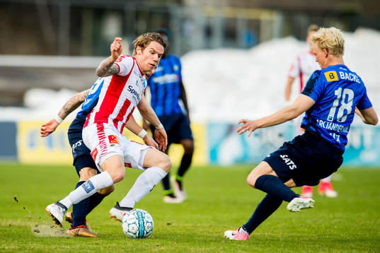 Robert Taylor of Tromsø and Jeppe Moe of Stabæk