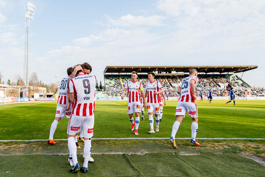 Slobodan Vuk of Tromsø celebrates with teammates