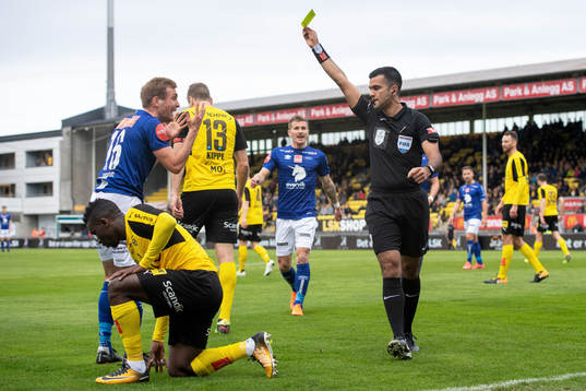 Kristoffer Løkberg of Ranheim is shown a yellow card