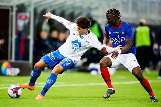 Mathias Normann of Molde and Sam Johnson of Vålerenga