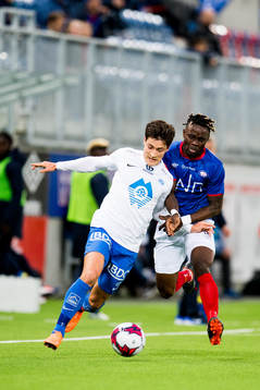 Mathias Normann of Molde and Sam Johnson of Vålerenga