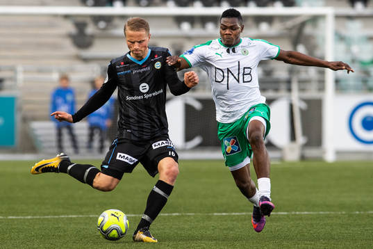 Tapio Heikkila of Sandnes Ulf and Abubakar Aliyu of HamKam