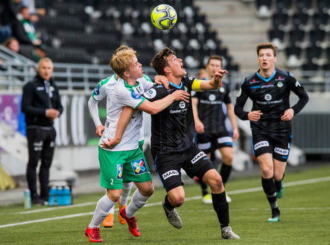 Morten Renå Olsen of HamKam and Niels Vorthoren of Sandnes