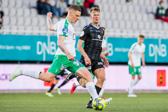 Orri Sigurdur Ómarsson of HamKam and Kent Håvard Eriksen