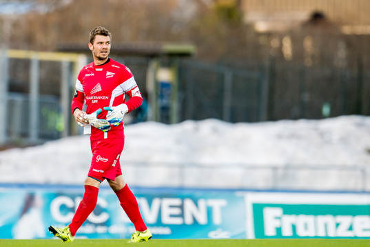 Goalkeeper Jonas Deumeland of Start walks off the pitch